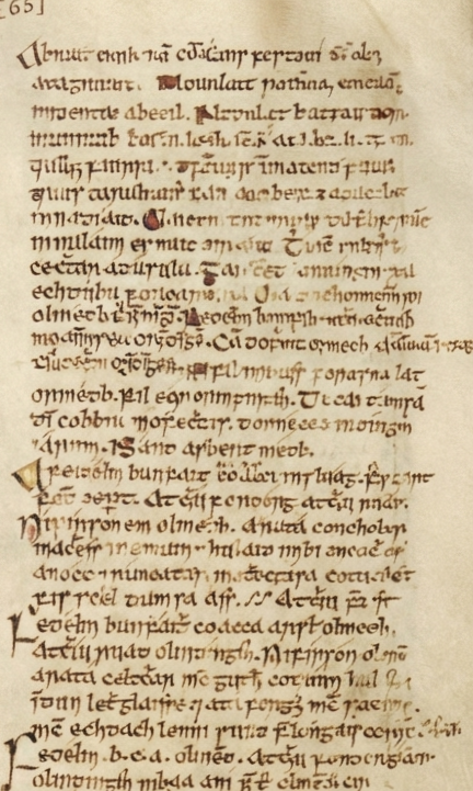 The same medieval manuscript leaf restored, the script and rubricated initials legible against cleaned vellum