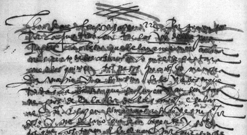 A Spanish secretary-hand manuscript with ink from the reverse bleeding through across every line