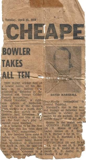 A newspaper clipping, creased and yellowed, its halftone portrait broken up by the damage