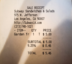 The same till receipt corrected and restored, the line items and total legible